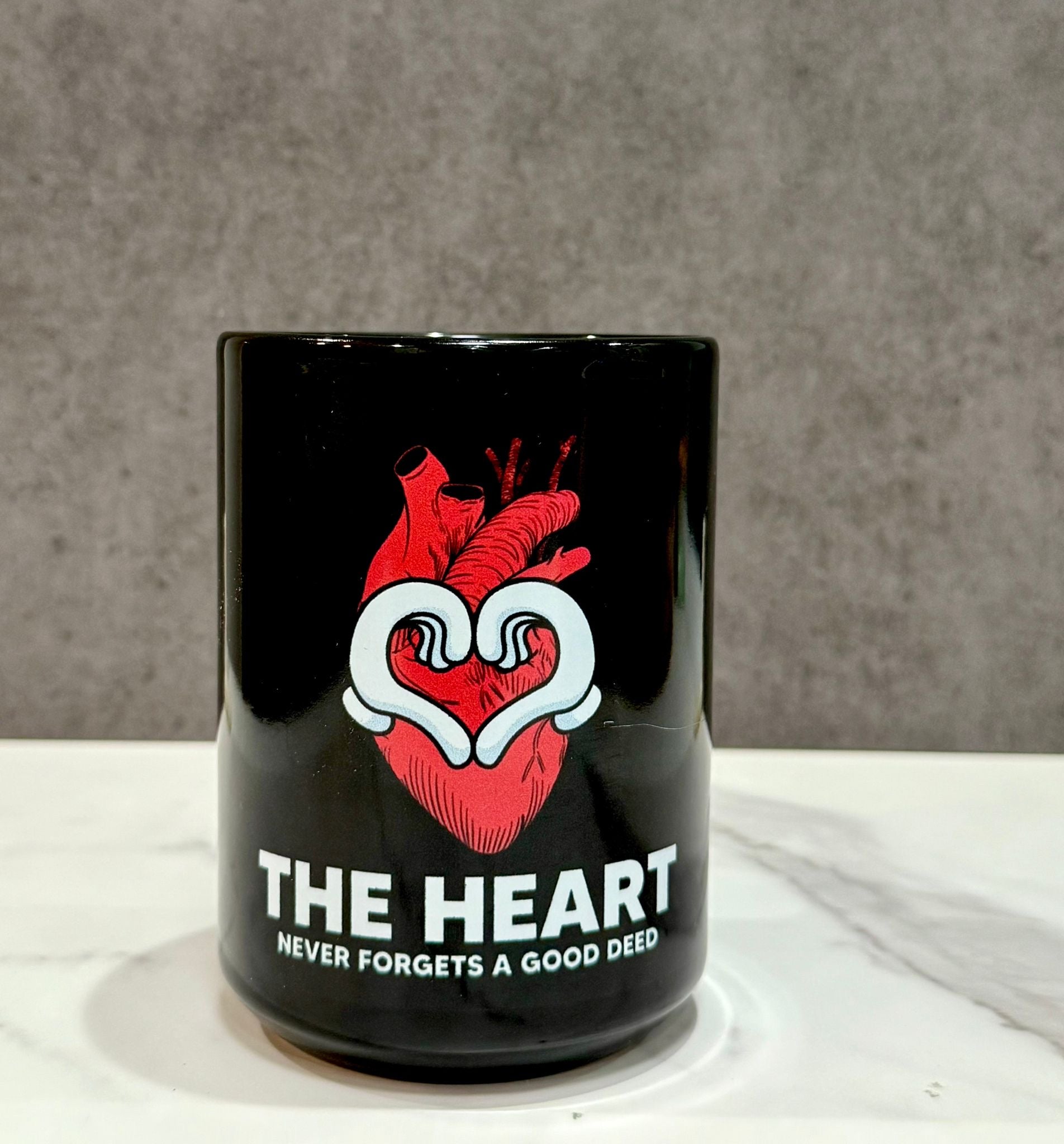 The Heart Never Forgets A Good Deed Black Glossy Mug-Motivational-Smart-inspiration-kind-caring-compassion