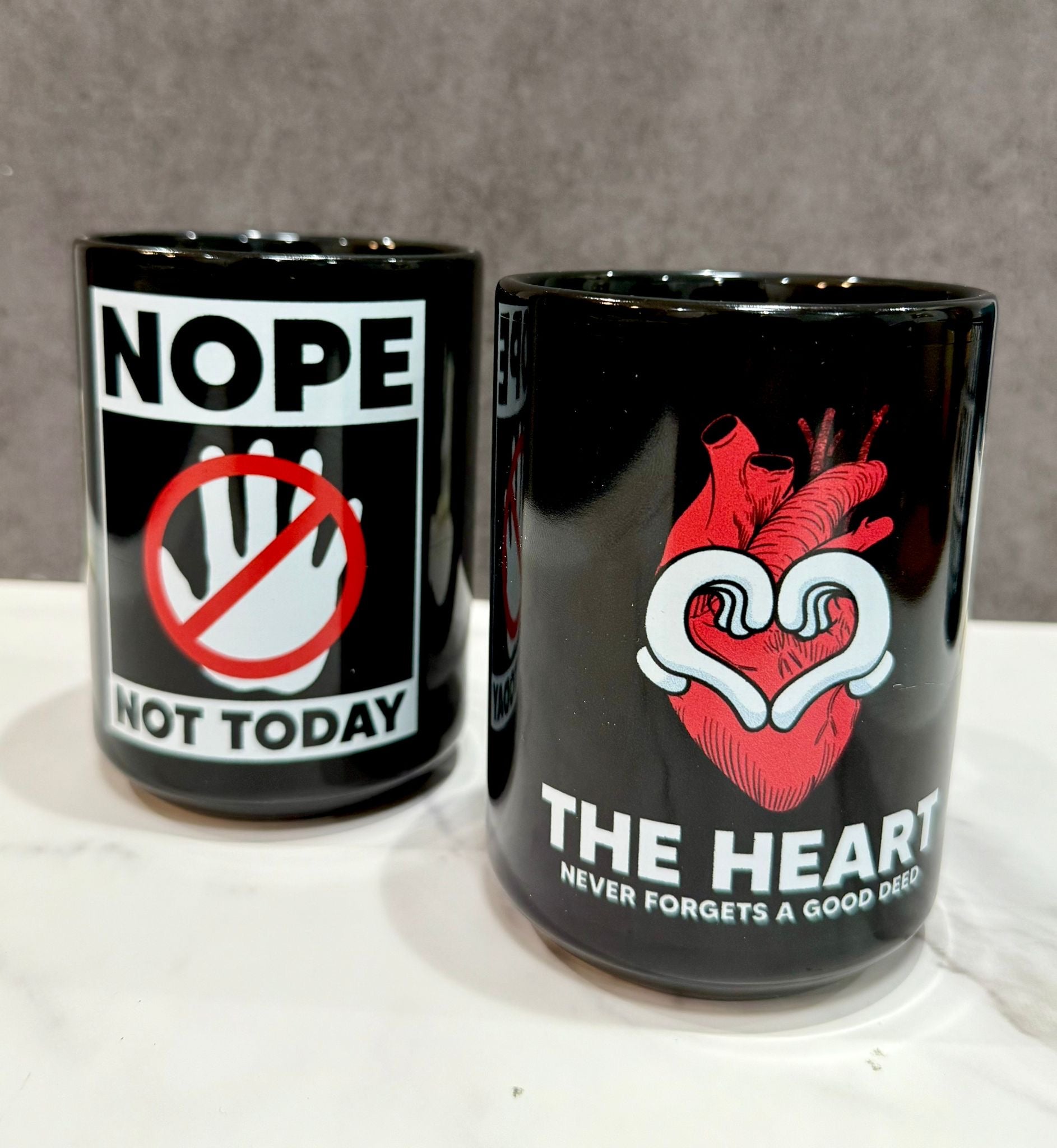 The Heart Never Forgets A Good Deed Black Glossy Mug-Motivational-Smart-inspiration-kind-caring-compassion