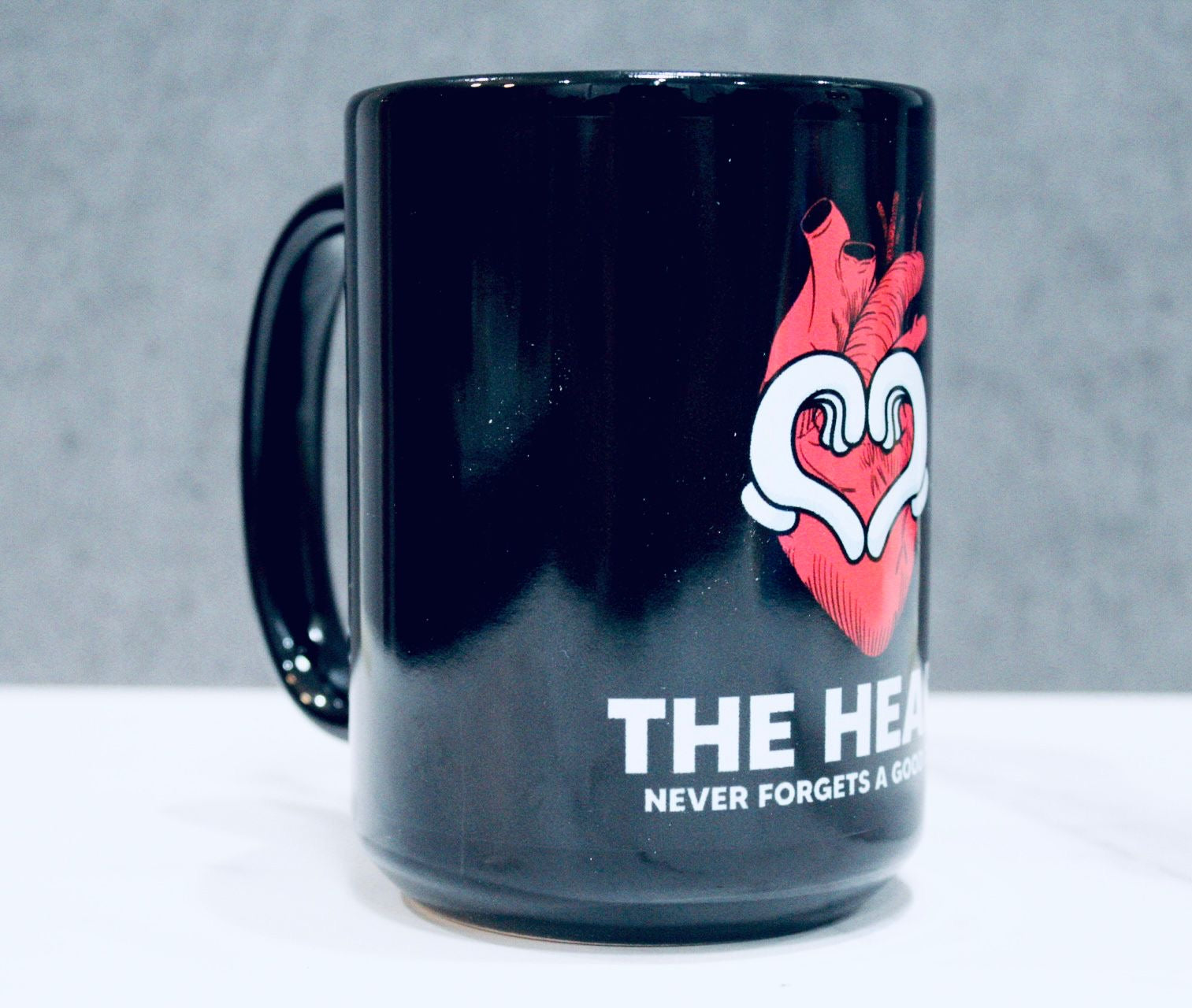 The Heart Never Forgets A Good Deed Black Glossy Mug-Motivational-Smart-inspiration-kind-caring-compassion